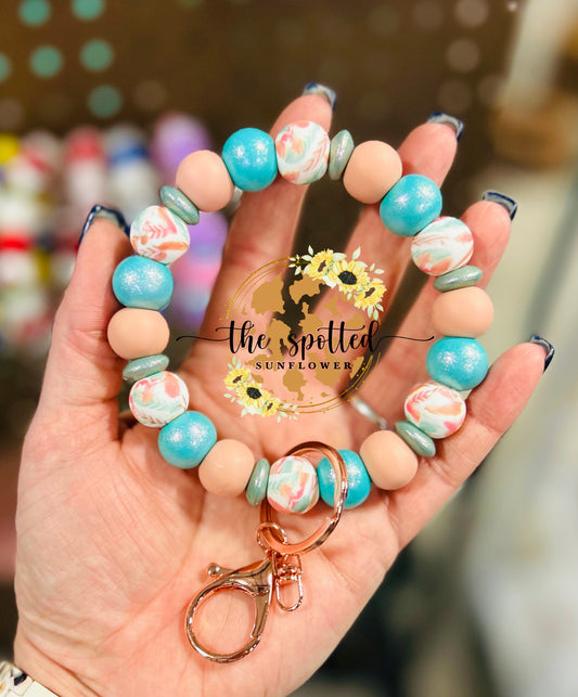 Feather Pastel Wristlet